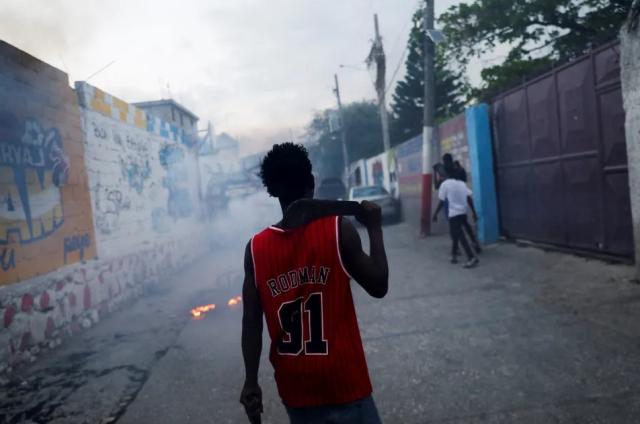 Haiti'de çetelere karşı intikam gruplarından acımasız saldırılar. Çete üyelerini yakıp, kafalarını kestiler